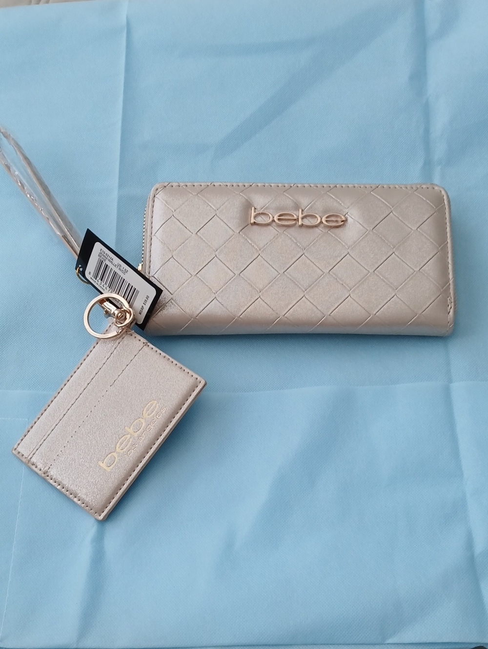 NWT bebe Quilted Wristlet Wallet in Metallic Champagne.